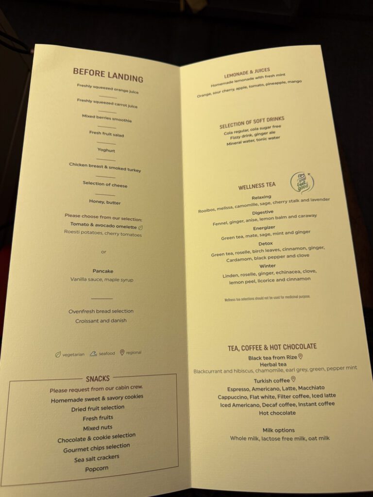 Turkish Airlines dinner menu with appetizer, soup, main-course and dessert choices.