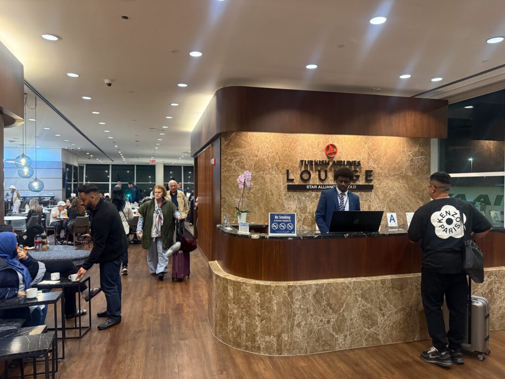 Marble reception desk with Turkish Airlines Lounge signage at JFK.